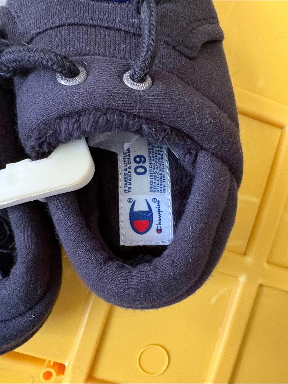 Champion Baby Black Slip-On Shoes with Blue & Red Logo